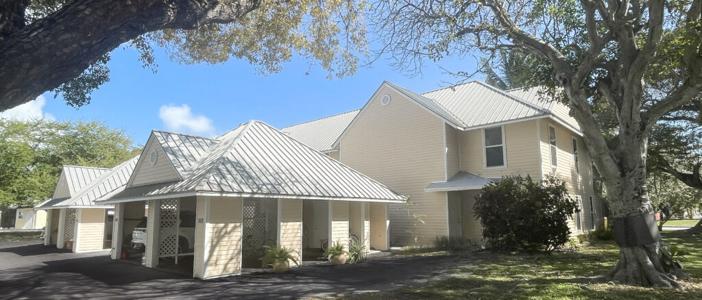 A pearl and gray roof house