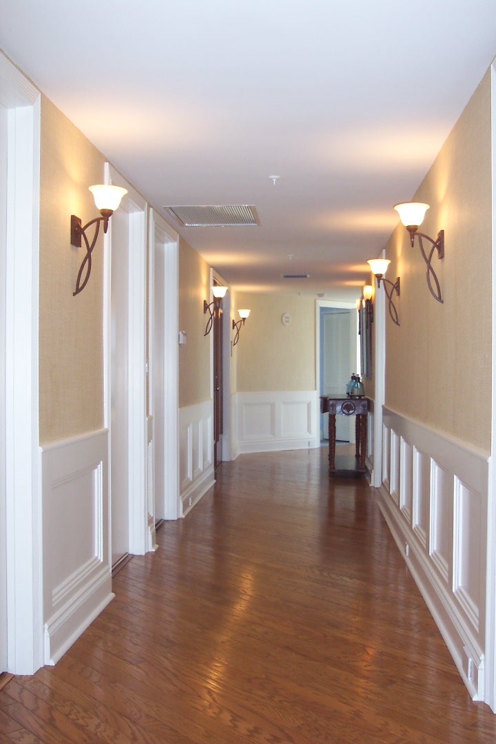 A hallway full of lamps