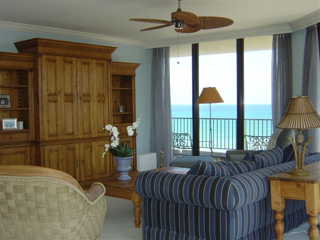 Living room with blue and black striped sofa