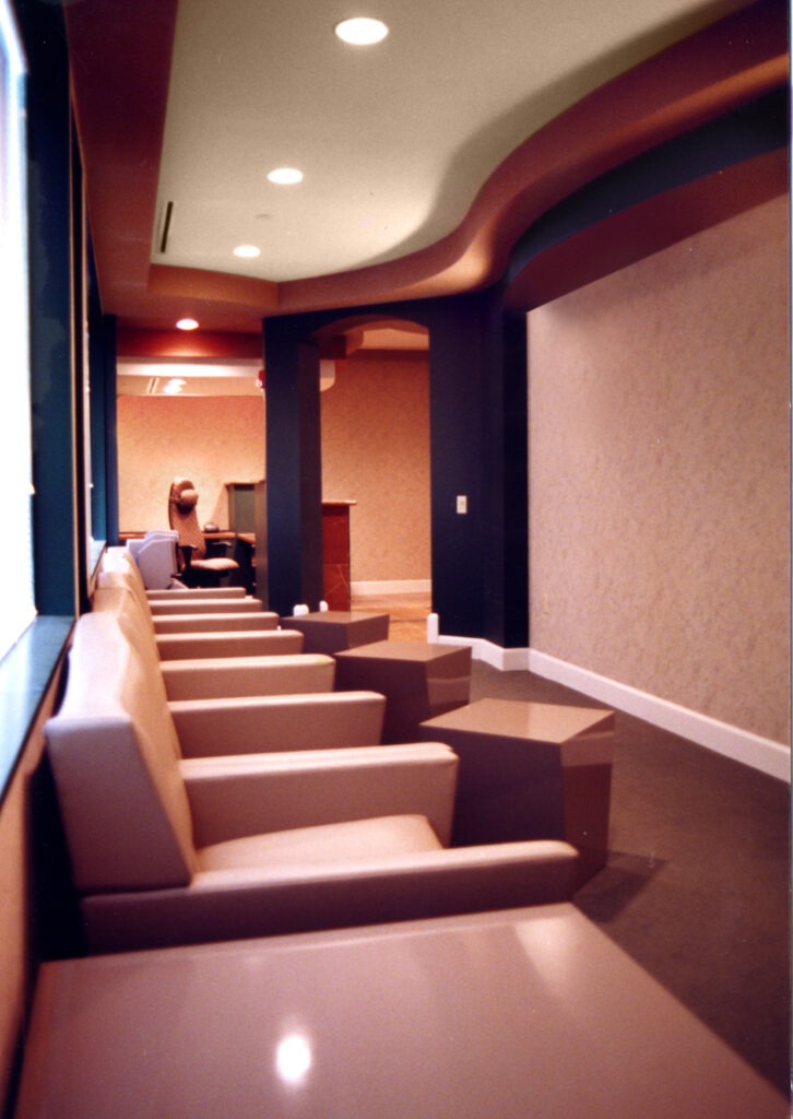 Room with different sofa chairs next to each other